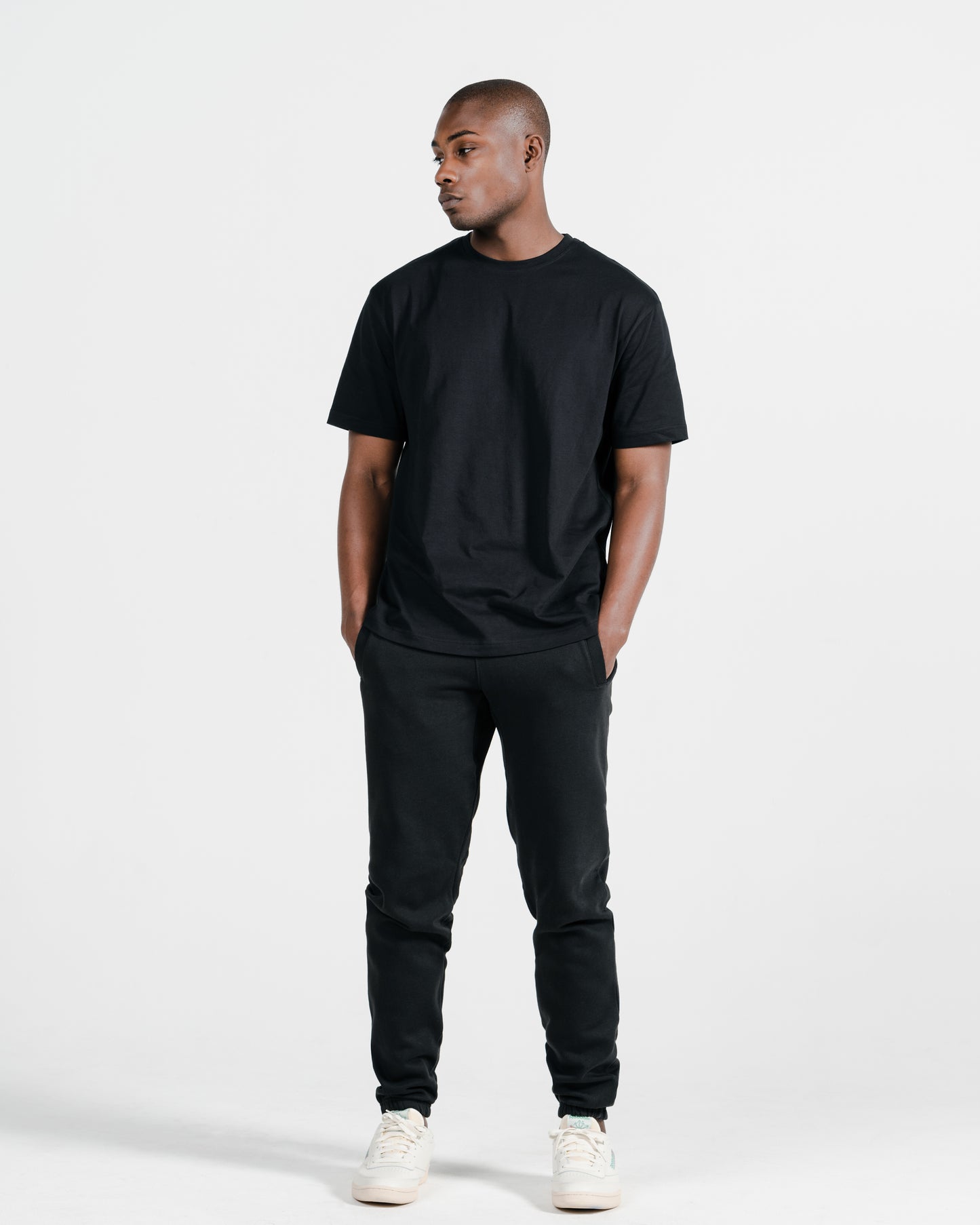 Model wearing Robenti Black Organic Cotton Sweatpants