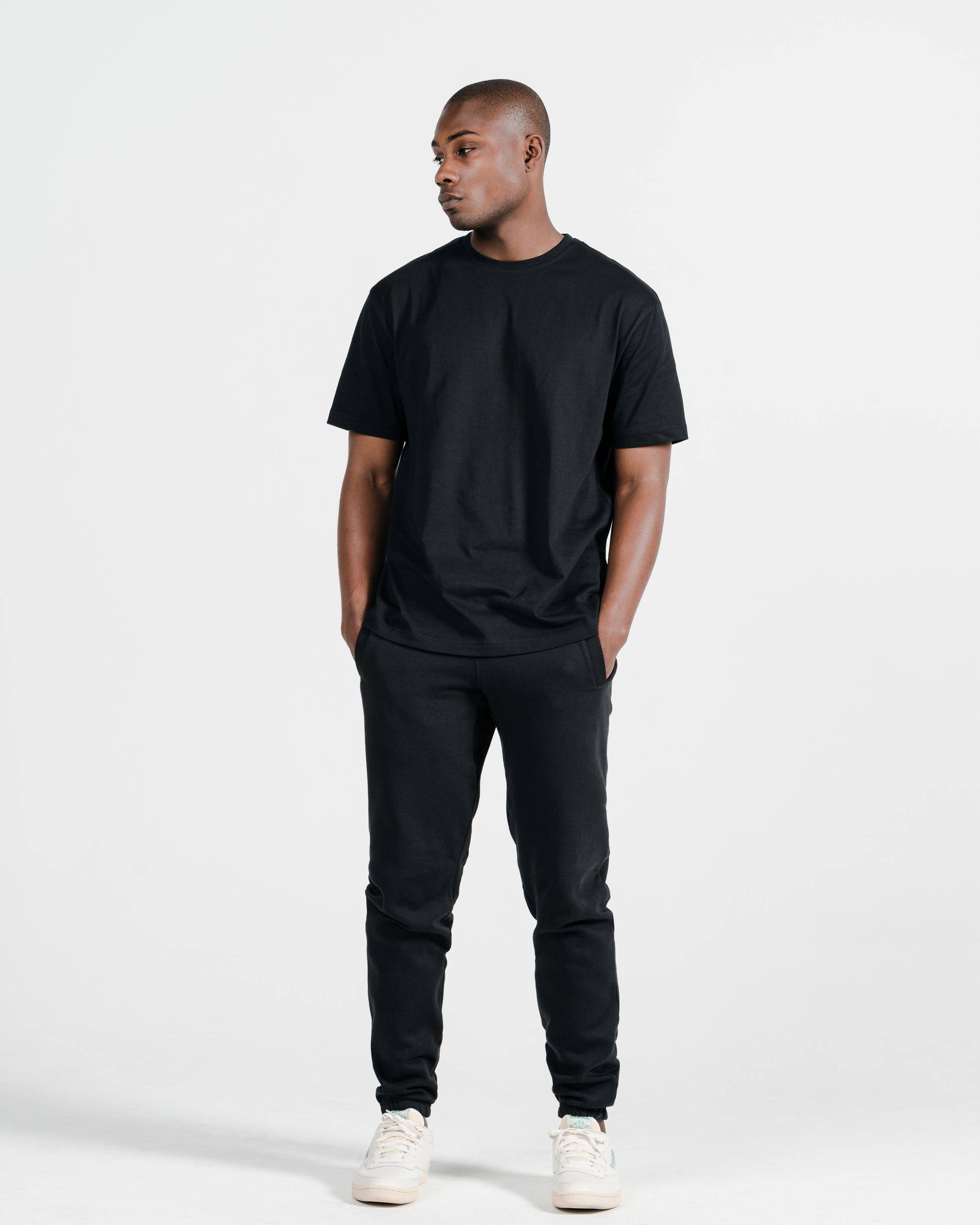 Model wearing Robenti Black Organic Cotton Sweatpants