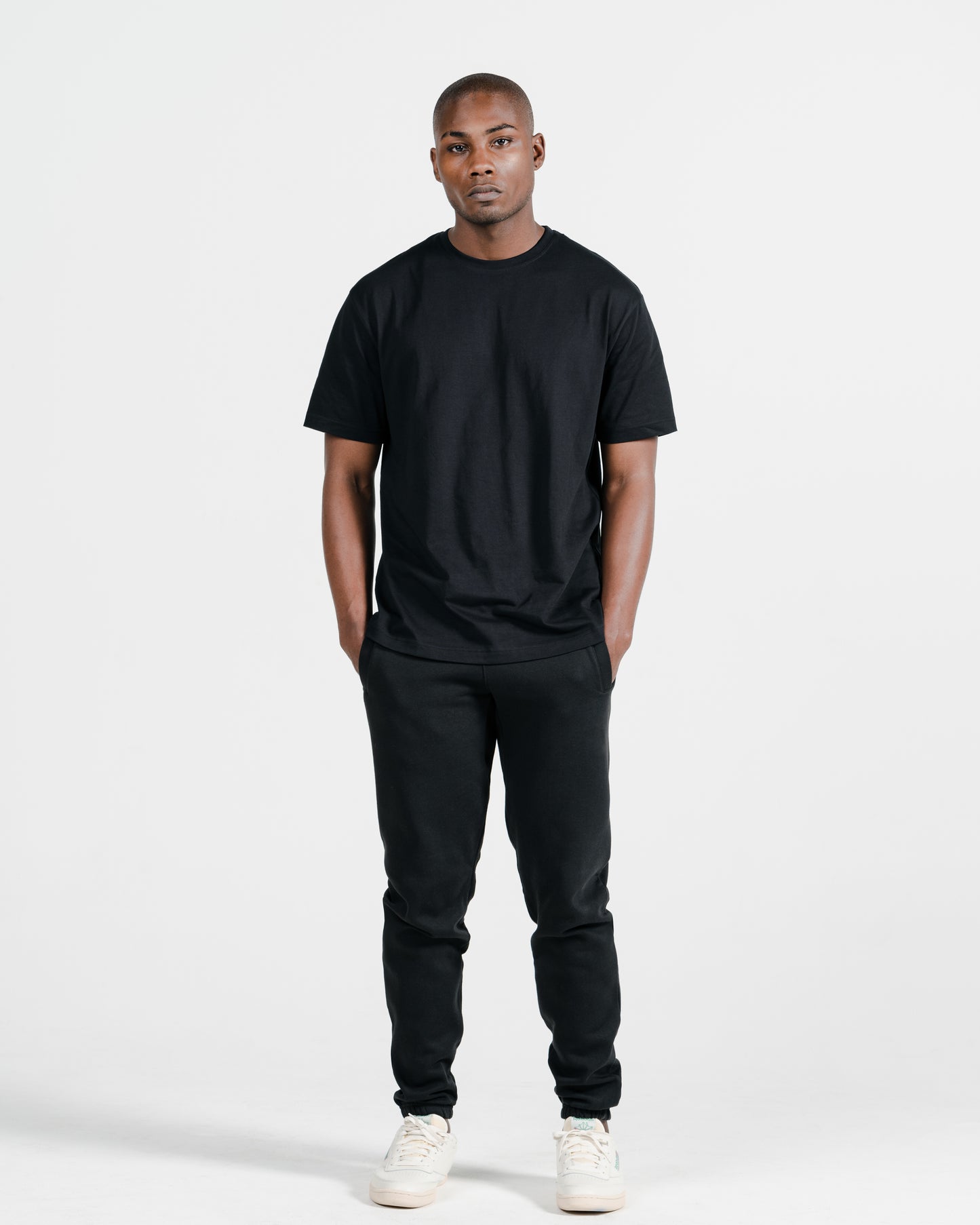Model wearing Robenti Black Organic Cotton Sweatpants