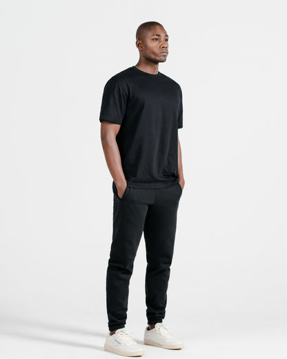 Model wearing Robenti Heather Grey Organic Cotton Sweatpants