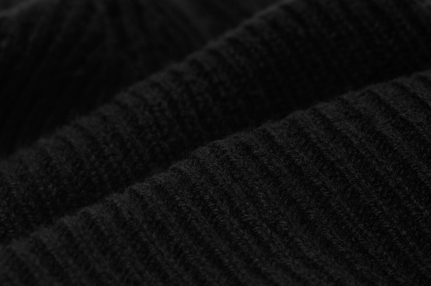 Close-up of merino wool and cashmere knit fabric on Robenti beanie